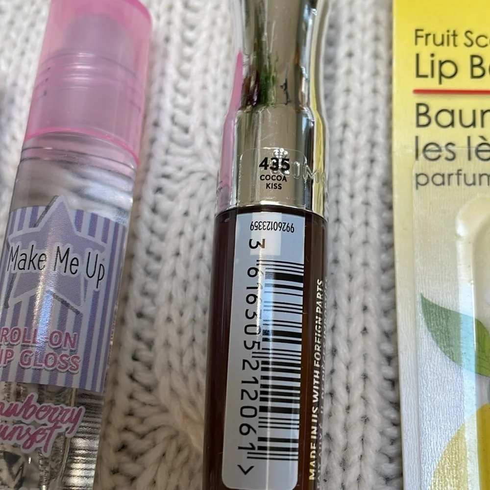 New Unused Lip gloss/balms lot of 4. Vanilla strawberry burst cocoa kiss lemon